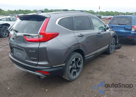 2018 Honda Cr-V Touring z USA, uszkodzony, nr VIN 7FARW2H90JE018638